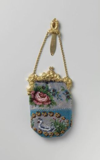Beaded purse with a gold handle and hook