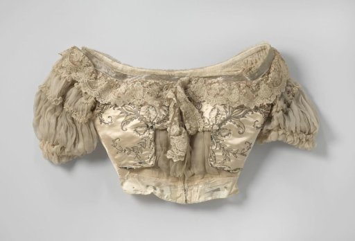 Bodice with low neckline and puff sleeves of salmon-colored satin, decorated with scroll and candelabra ornament of silver thread, spangles, chenille and silk