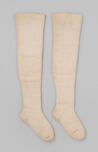 Stockings of plain cream-colored cotton, lined with raw wool