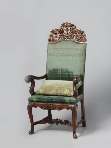 Armchair of walnut, upholstered in green velvet. On the back a panel with the crowned coats of arms of Zeeland, Holland and West-Friesland