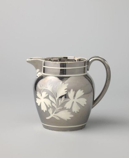 Milk jug of hard-baked earthenware; cream ware from Leeds with silver