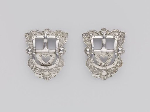 Pair of belt buckles