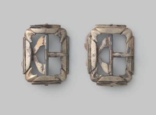 A pair of belt buckles