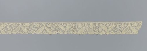 Strip of needle lace with feather-shaped and plume-shaped leaves and flowers