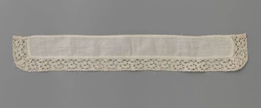 Strip of bobbin lace with a tangle of knobs around a rectangular piece of linen