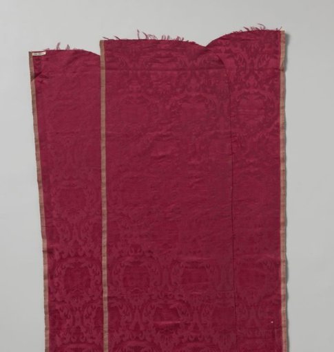 Five sewn-together fragments of red silk damask
