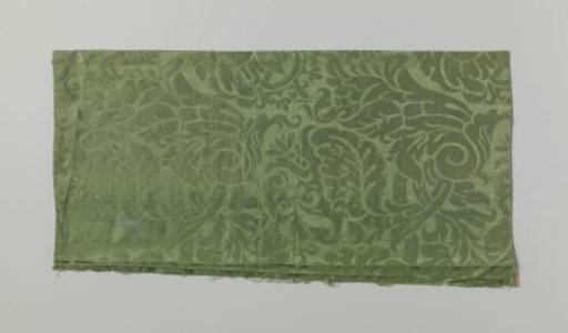 Fragment of green silk damask