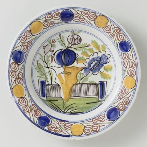 Panel of polychrome painted faience with floral decoration