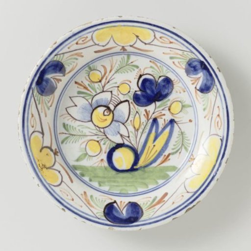 Faience plate with multicoloured painting and floral decoration