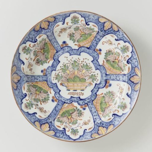 Plate of polychrome faience with a decoration of flower baskets