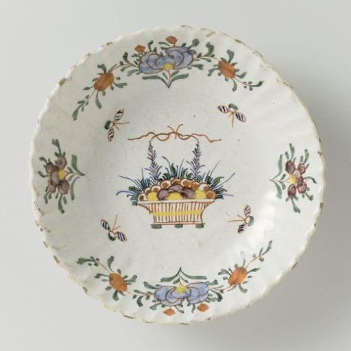 Polychrome painted faience dish