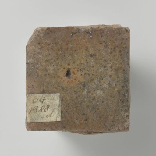 Brown-glazed floor tile