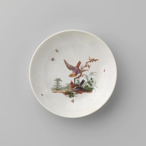 Cup with birds in a landscape