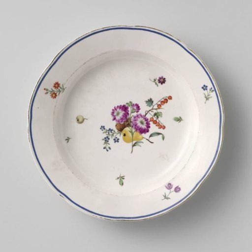 Plate with a bouquet and flowers