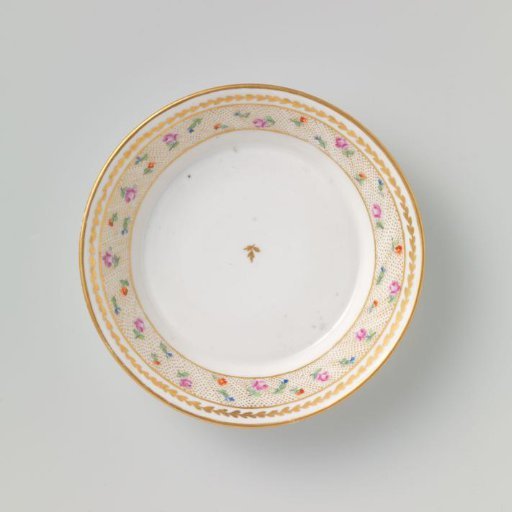 Saucer with flower sprays and a foliate scroll