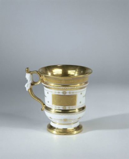 Cup with musical instruments and weapons