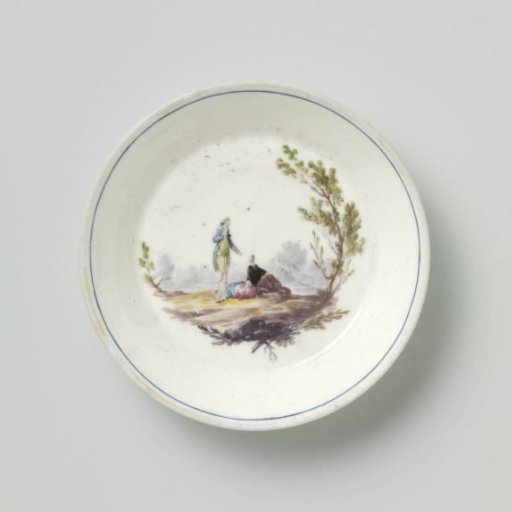 Saucer with a couple in a landscape