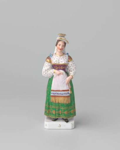 Bottle in the shape of a woman in folk costume