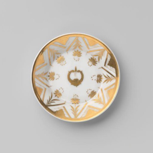 Saucer with a musical instrument, triangles and stylized flowers