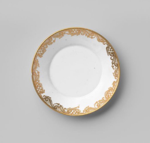 Saucer with foliate scrolls and diaper pattern border