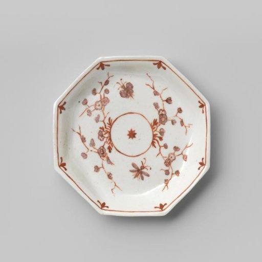 Saucer with flowering plants and insects