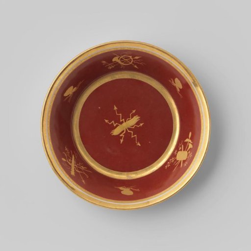 Saucer with objects and insects on a red ground