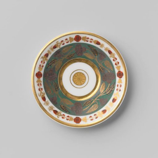 Saucer with a matte green border with floral scrolls