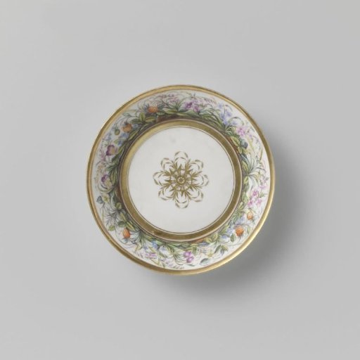 Saucer with flowering plants