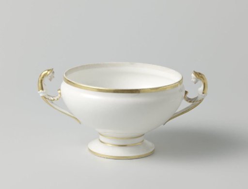 Tureen with golden borders and woman's heads