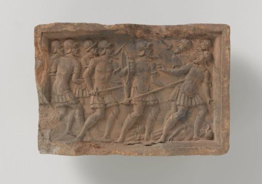 Fireplace with a depiction of attacking warriors