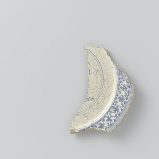 Fragment of a plate, painted in blue under the glaze with a border of flowers and on the flat a double band