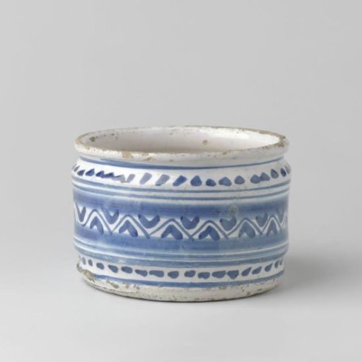 Ointment pot, blue painted with geometric motifs.