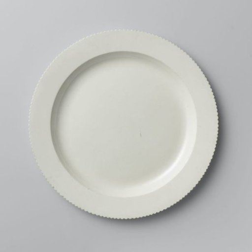 Round plate of hard-fired earthenware; Wedgwood creamware.
