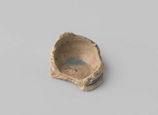 Majolica pot sherd with ring foot, decorated in blue and black