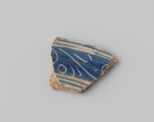 Majolica sherd with blue decoration