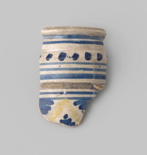 Majolica sherd with blue and yellow decoration