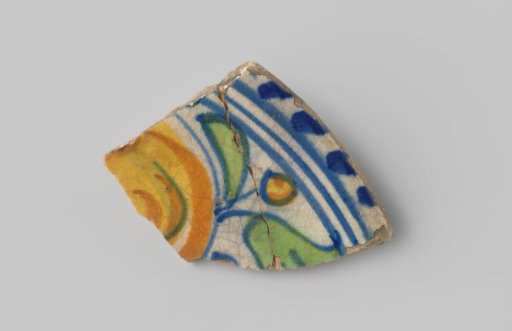 Majolica sherd with blue, yellow, green and orange decoration