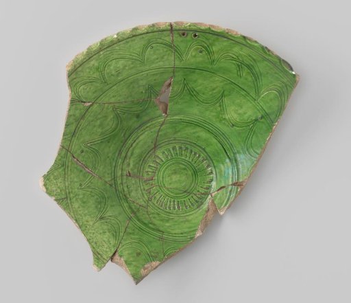 Fragment of a glazed dish