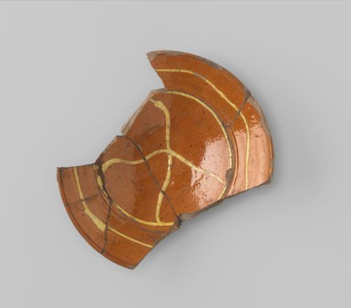 Fragment of a glazed dish
