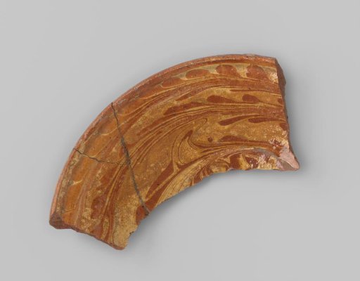 Fragment of a marbled dish