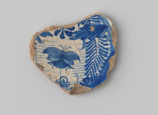 Sherd of white-firing earthenware, with a decoration on the front of plants and an insect in blue