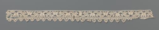 Strip of Lace Embroidery with Cup Flower or Crown Between Stretched S-Scrolls and with a Shell Border of Needle Lace