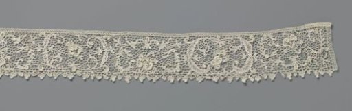 Strip of needle lace with crown in oval cartouche