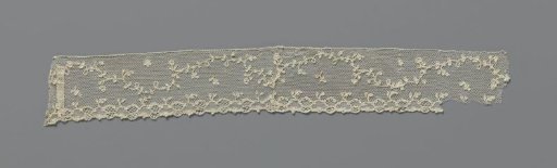 Strip of needle lace with winding branch