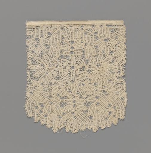 Strip of bobbin lace with a candelabra motif