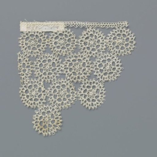 Fragment of knotted lace with small circles