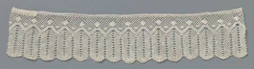 Strip of bobbin lace with stylized hanging ears of corn
