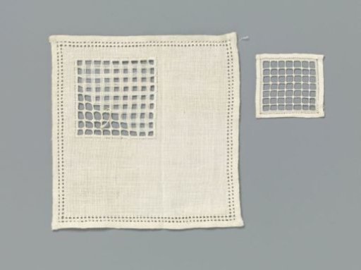 Steel linen with lace embroidery with drawn threads in one corner with a square grid