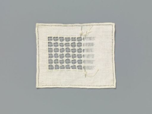 Steel linen with lace embroidery with drawn threads and four-pointed stars in a square grid