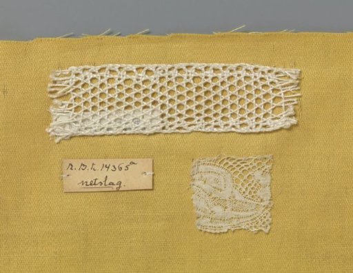 Steel bobbin lace with coarse thread as an example of a ground in net stitch